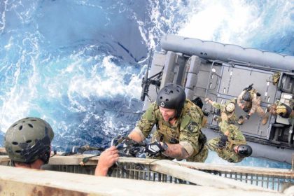 US Navy SEALs boarding ship
