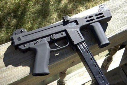 The Spectre M4 equipped with a suppressor
