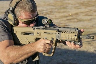 Soldier aim with its IWI Tavor assault rifle