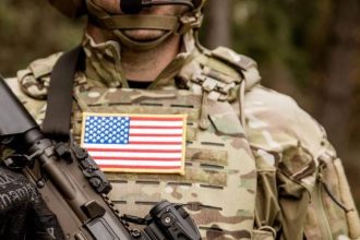 Aimpoint CompM5B mounted on rifle