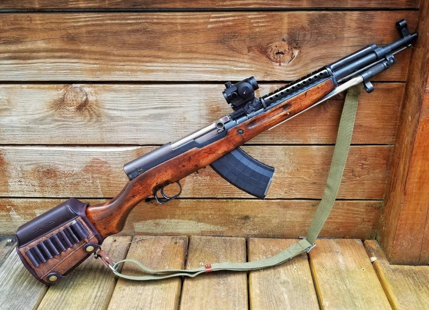 SKS rifle with 30 round magazine and installed optical sight