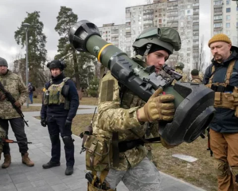 A Ukrainian Territorial Defence Forces member holds an NLAW anti-tank weapon, in the outskirts of Kyiv, Ukraine, on March 9, 2022