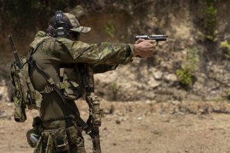 US Navy SEAL firing his sidearm at the shooting range in Philippines