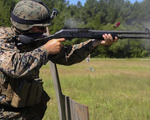 Soldier fires Benelli M4 tactical shotgun