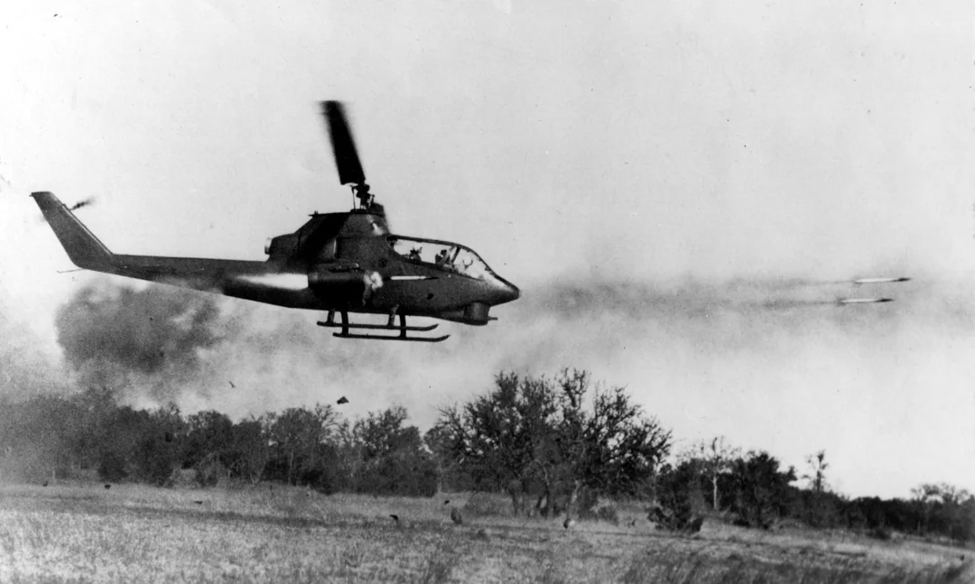Bell AH-1 Cobra helicopter providing fire support during the Vietnam War