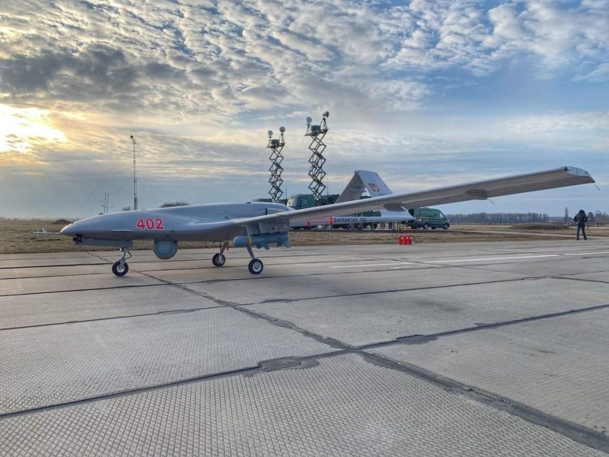 A Bayraktar TB2 of the Ukrainian Air Force armed with MAM-L; two ground control stations are in the background