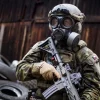 Czech soldier wearing OM-95 gas mask during CBRN training