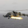 Martlet missile launch from Royal Navy Wildcat helicopter over open sea