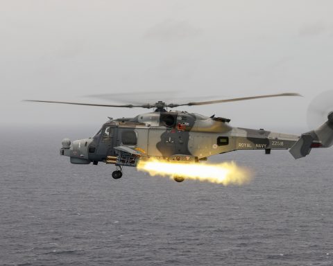 Martlet missile launch from Royal Navy Wildcat helicopter over open sea