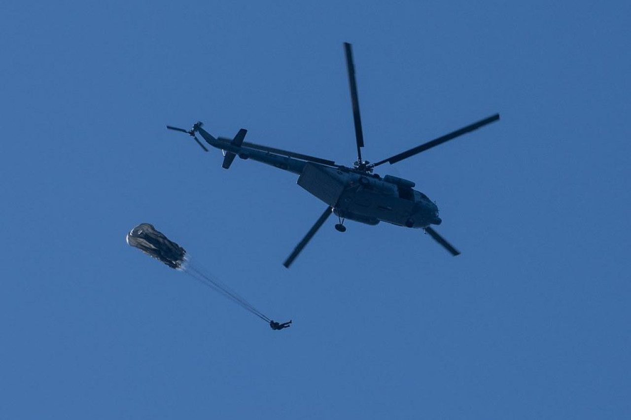 Croatian Special Forces parachuter jumps from a Mi-8 helicopter during JCET exercise