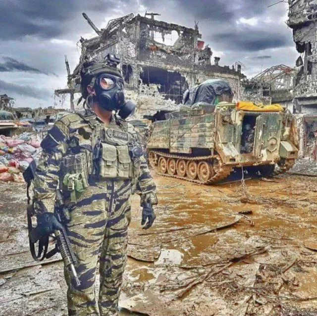 Philippine Army Special Forces soldier wearing SanCheong K3 gas mask for CBRN protection
