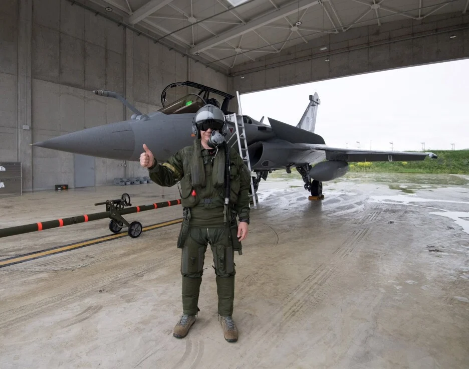 Croatian fighter pilot standing next to a Rafale jet
