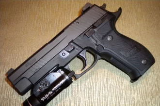 Sig Sauer M11 with TLR-1 flashlight attached