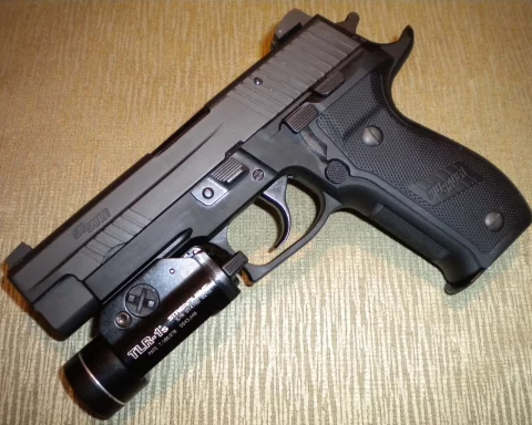Sig Sauer M11 with TLR-1 flashlight attached