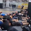 Russian police detain dozens of men lying face down in a gym during a military draft raid in Moscow