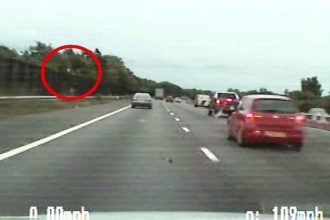 West Midlands Police say the dash-cam footage of the dramatic moment a drug dealer throws £200,000 of heroin from his car is the force's pursuit of the year. The 12-mile chase happened along the M6